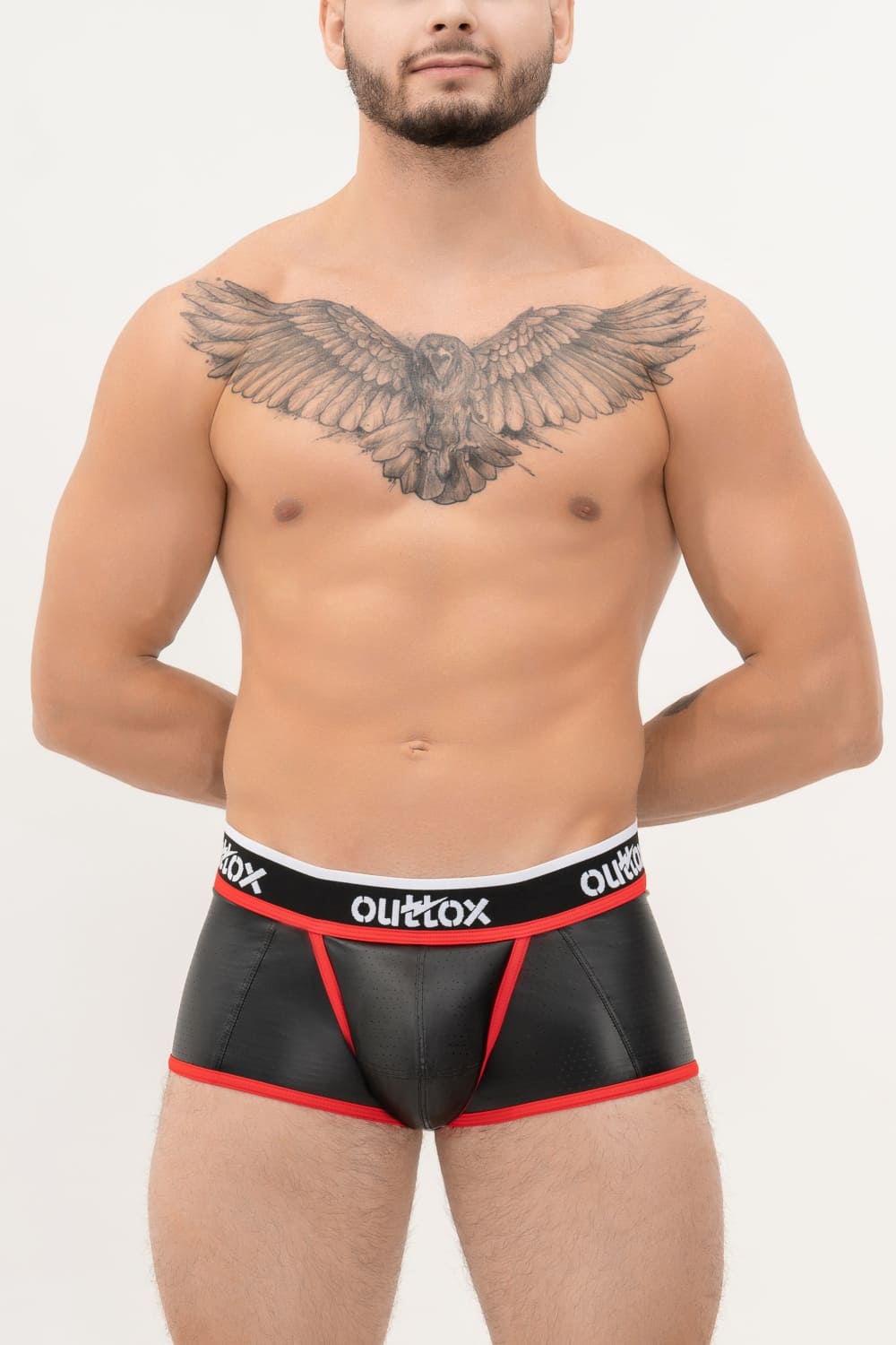 Outtox. Shorts mit offenem Rücken und Druckknopf-Codpiece. Schwarz+Rot