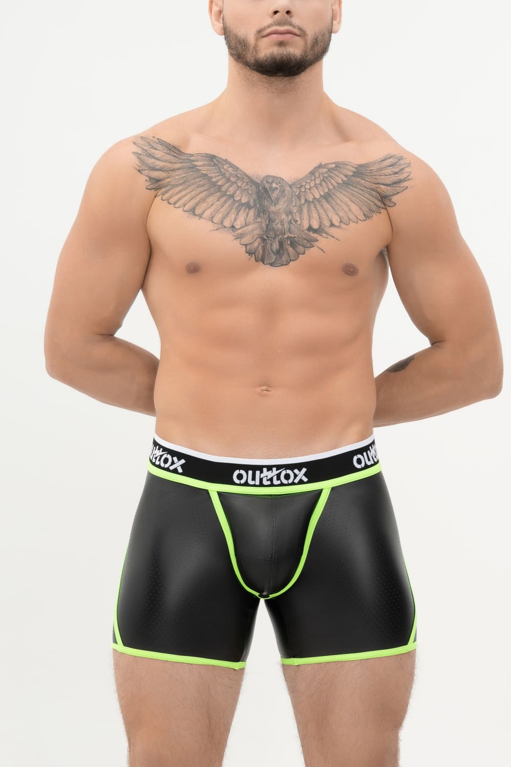Outtox. Shorts mit offenem Rücken und Druckknopf-Codpiece. Schwarz+Grün „Neon“