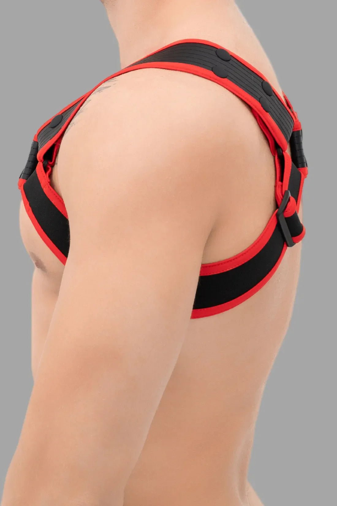 Maskulo Outtox Body Harness with Snaps in Black and Red, size Large. Fashionable body accessory for adults.