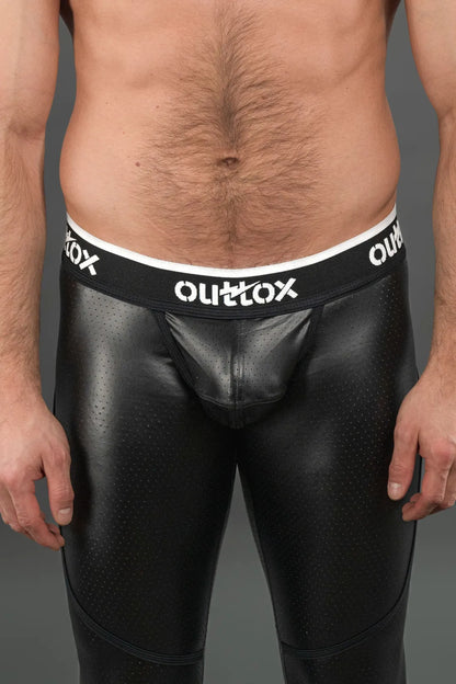 Outtox. Achterlegging met ritssluiting en drukknoopsluiting. Zwart