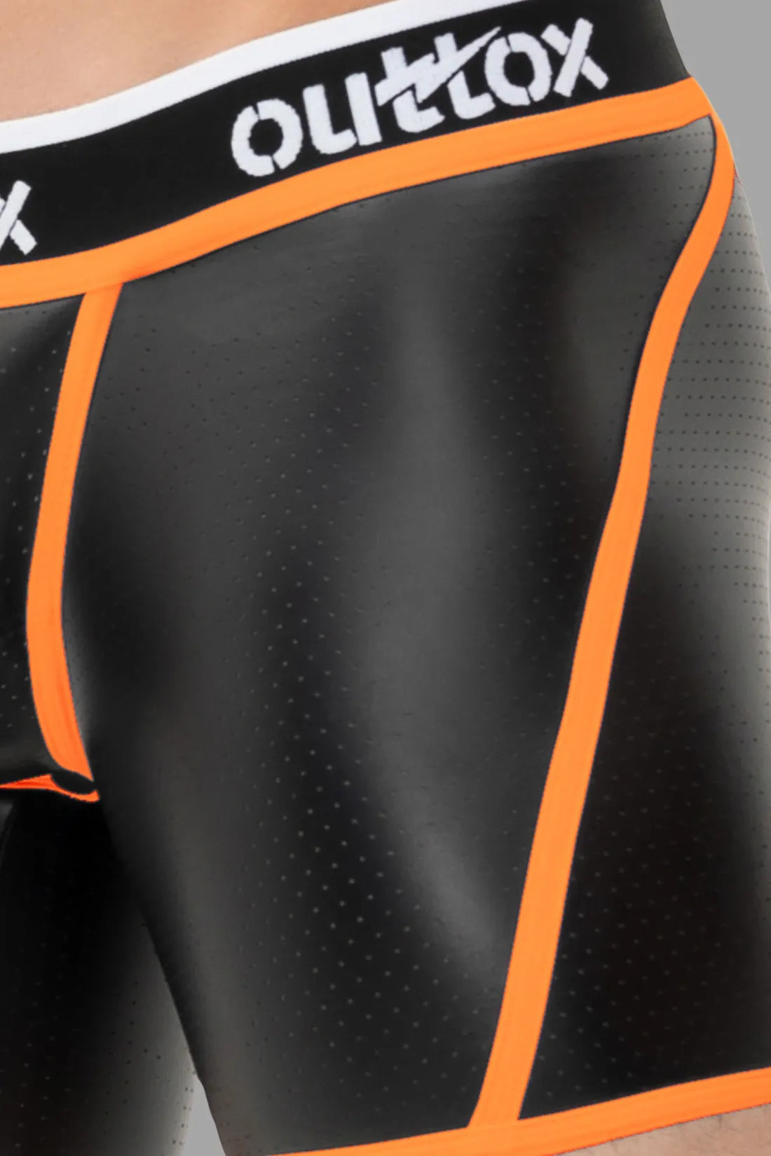 Outtox. Shorts mit offenem Rücken und Druckknopf-Codpiece. Orange „Neon“