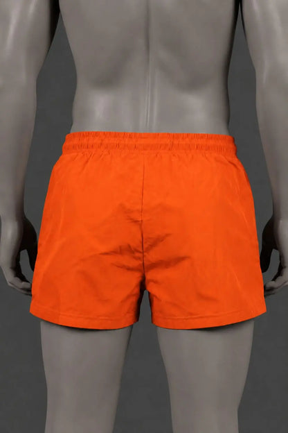Jedd Synther Weiche Shorts mit Reißverschlusstaschen. Orange