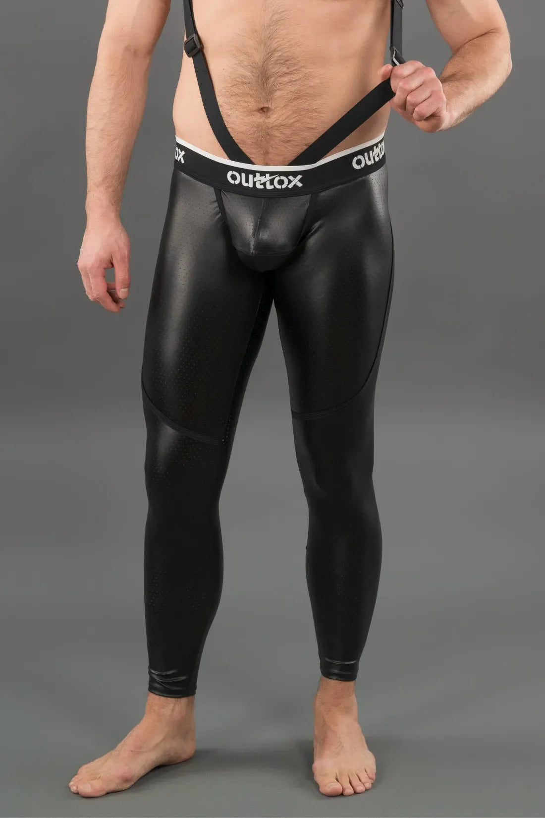 Outtox. Leggings mit Reißverschluss hinten und Druckknopf-Codpiece. Schwarz