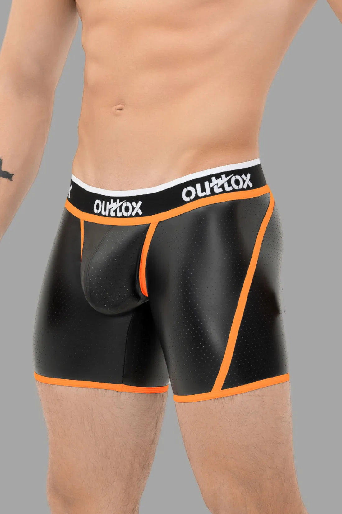 Outtox. Kurze Strumpfhose mit Wickel-Rücken. Schamkapsel mit Druckknopf. Schwarz und Orange